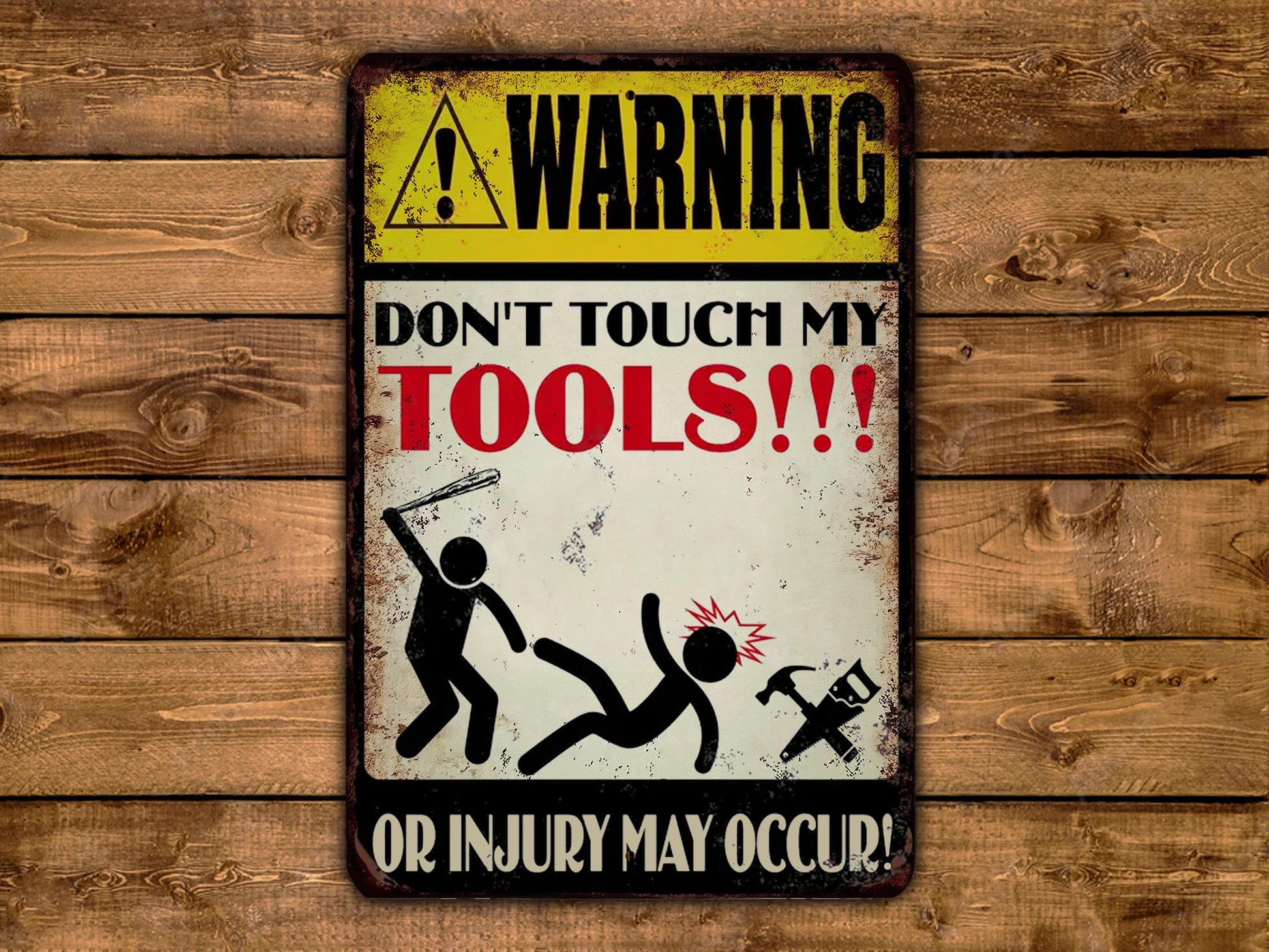 a warning sign on a wooden wall that says, don't touch my tools