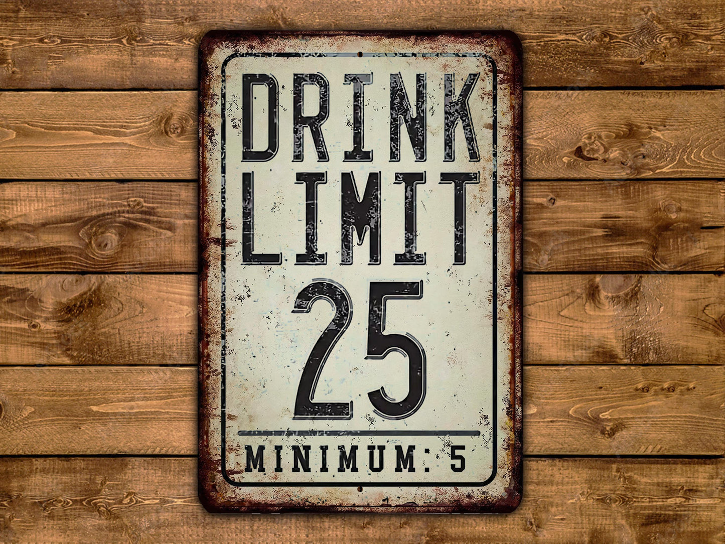 a sign on a wooden wall that says drink limit 25