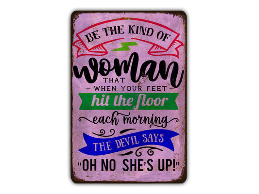 a sign that says be the kind of woman that your feet hit the floor each