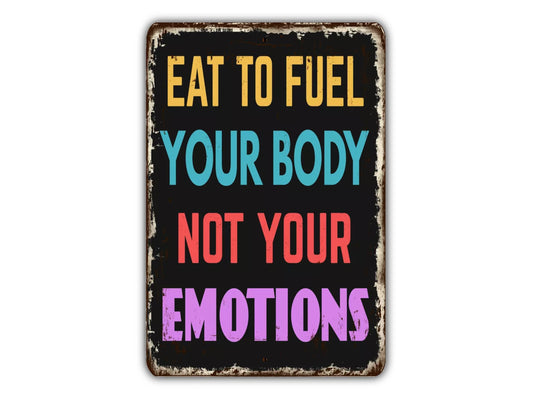 a sign that says eat to fuel your body not your emotions