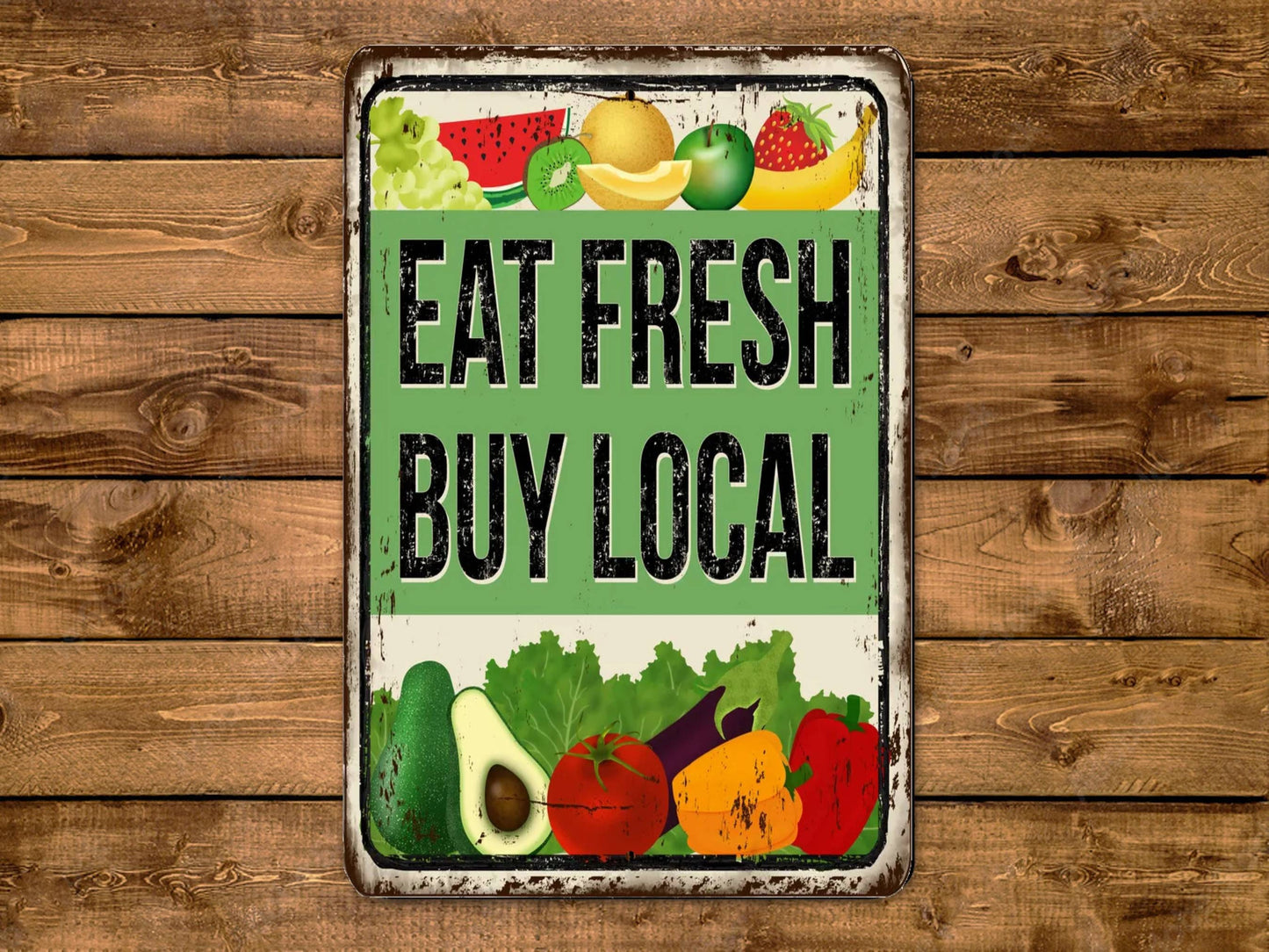 a sign that says eat fresh buy local