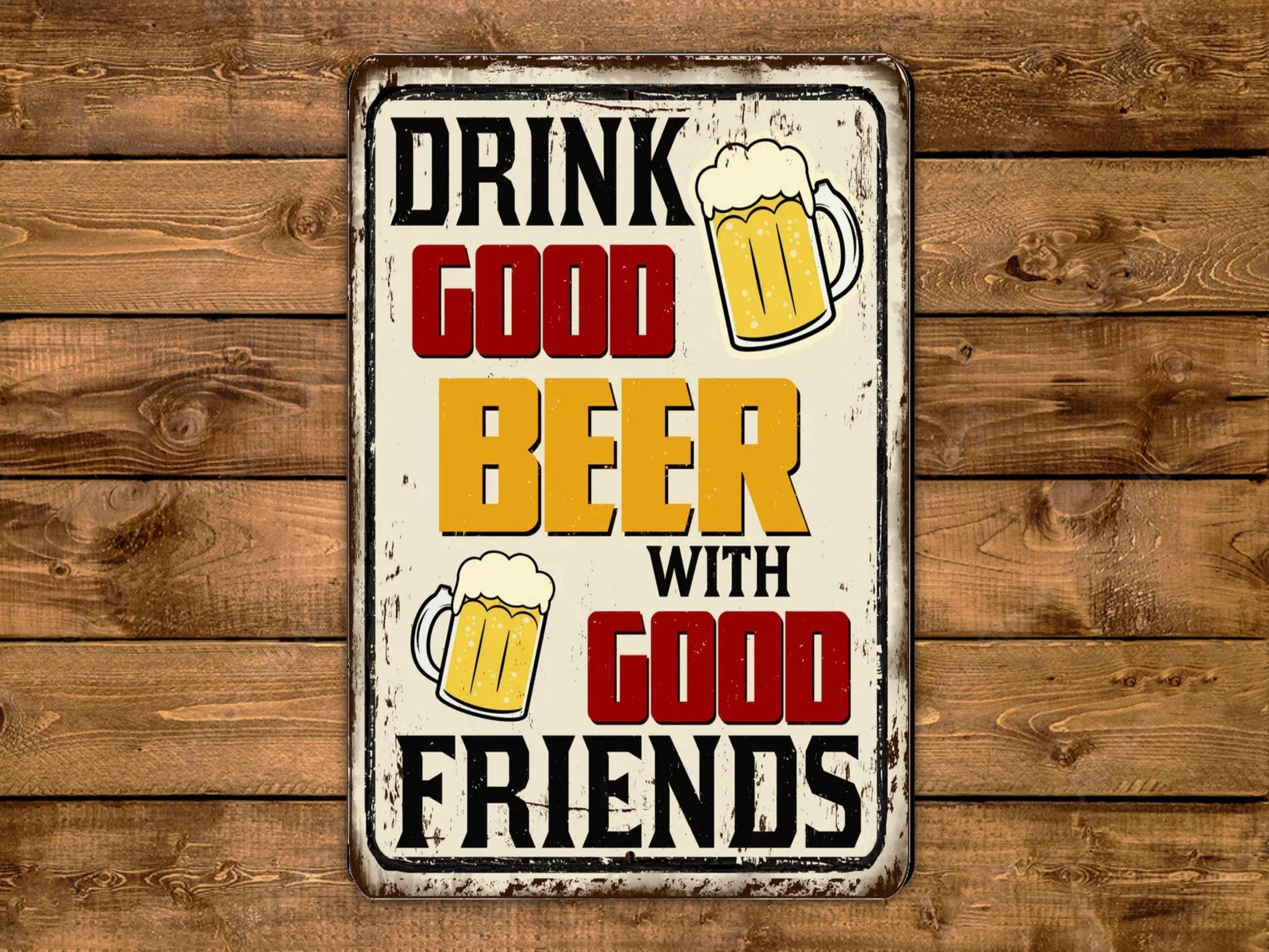 a metal sign that says drink good beer with good friends