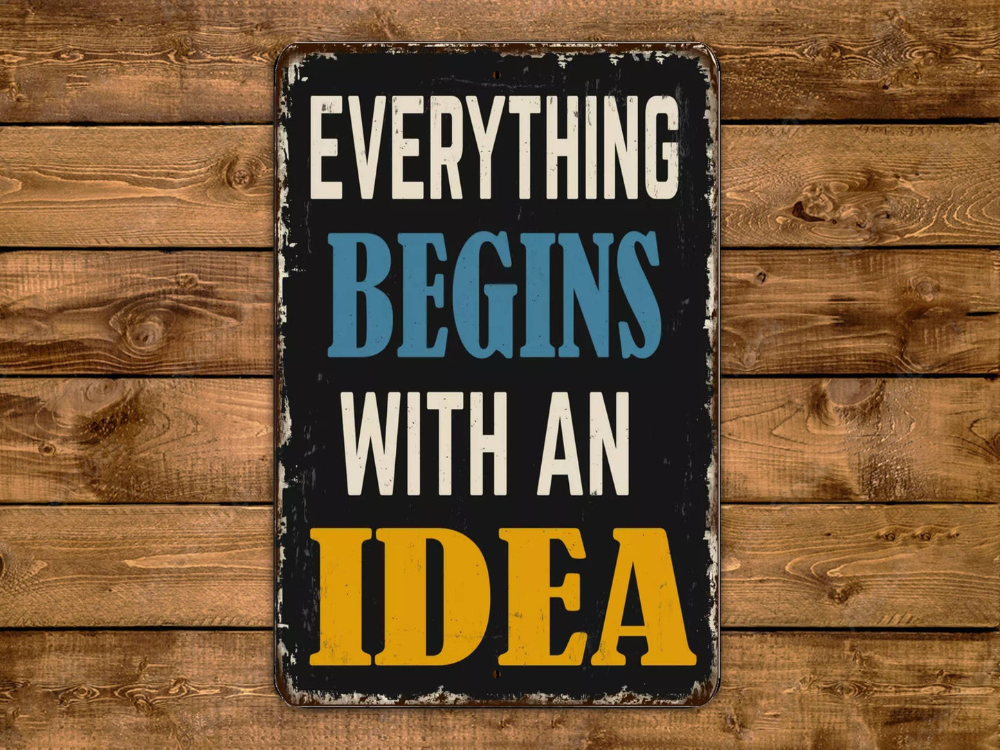 a sign that says everything begins with an idea